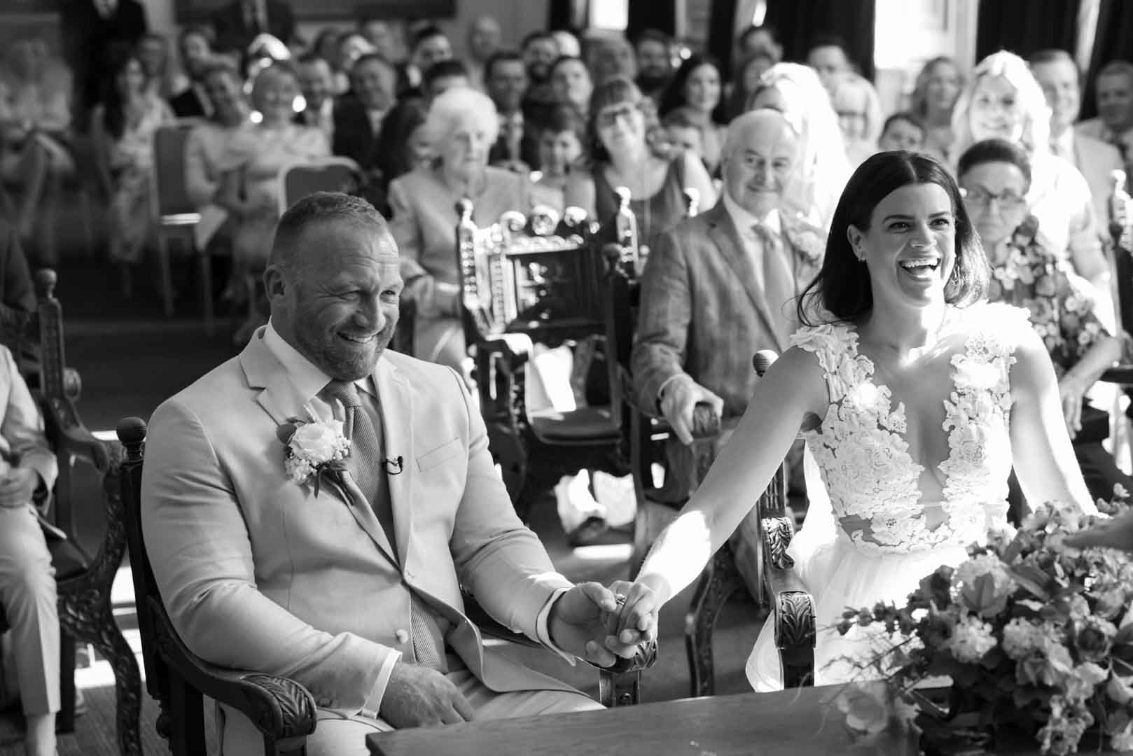 Relaxed looking Bride & Groom at Windsor Guildhall