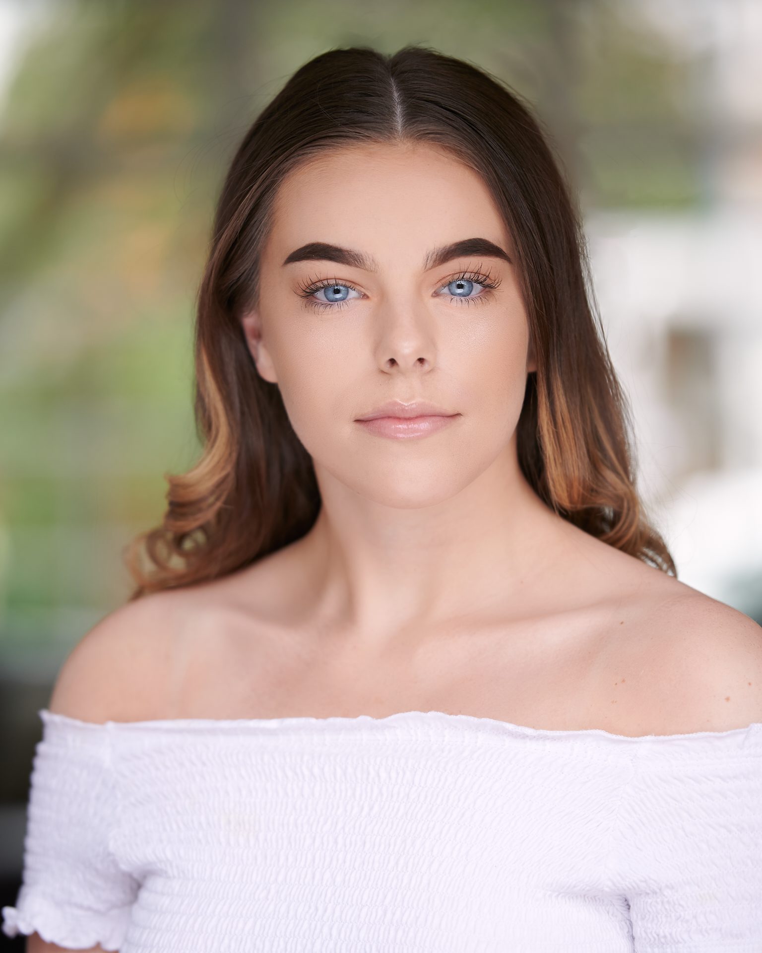 Sophie Bond shallow depth of field, headshot, white top,