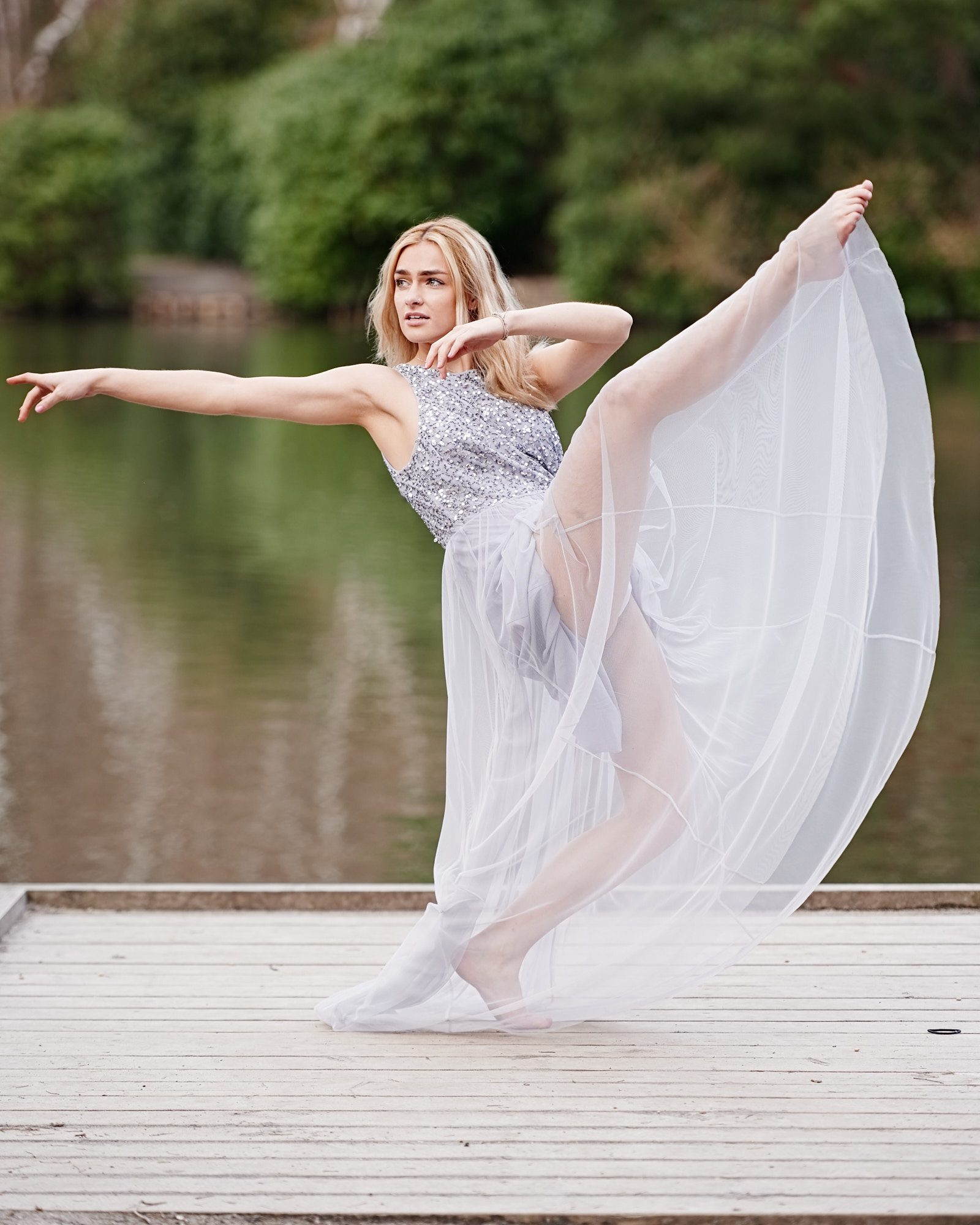 Surrey Dancer posing by a lake