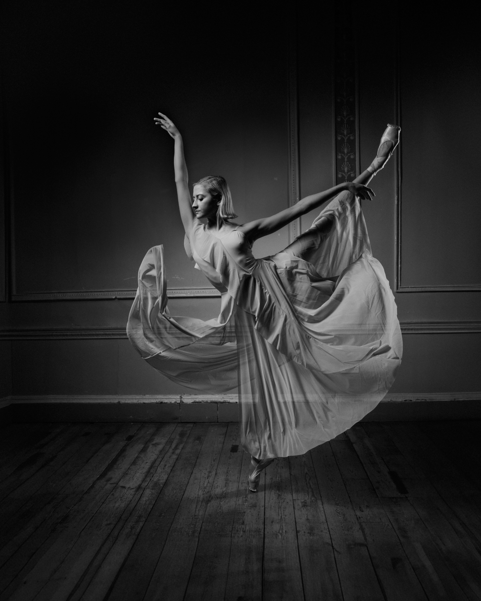 Surrey dancer in demi pointe with long flowing fabric